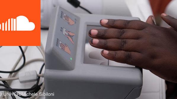 a child's fingerprints are taken using a machine